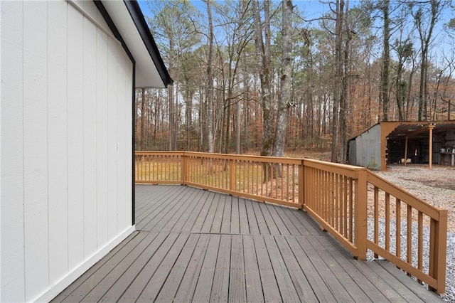 deck featuring an outdoor structure