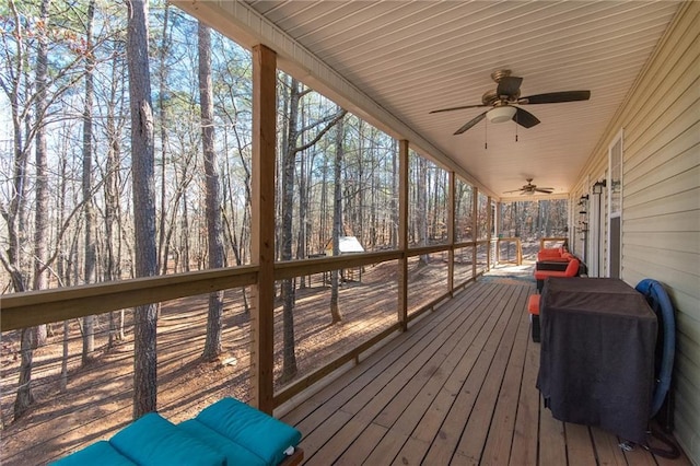 wooden terrace with ceiling fan