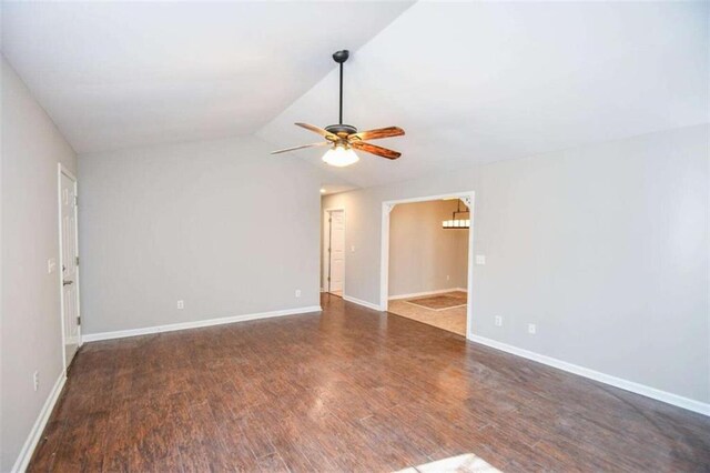 unfurnished room featuring ceiling fan and dark hardwood / wood-style flooring