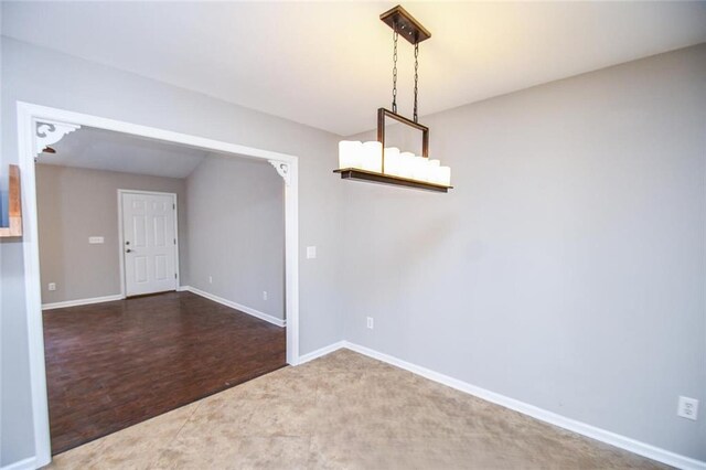 unfurnished dining area with wood-type flooring