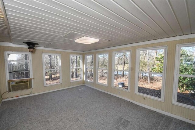 unfurnished sunroom with cooling unit