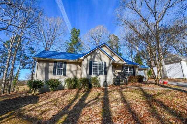 ranch-style home with a garage