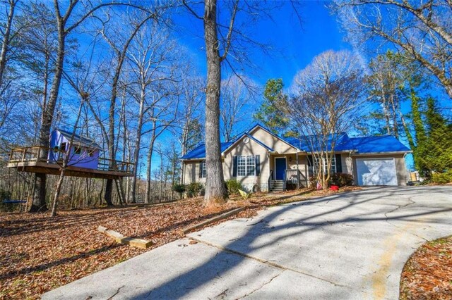 ranch-style home with a garage