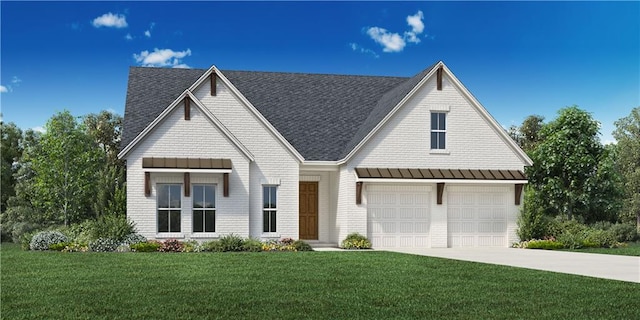 view of front of property featuring a garage and a front yard