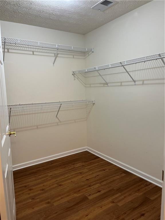 802 Village Pl, Loganville, GA 30052 - walk in closet featuring wood finished floors
