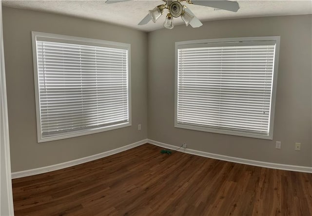 802 Village Pl, Loganville, GA 30052 - unfurnished room with wood finished floors, baseboards, ceiling fan, and a textured ceiling