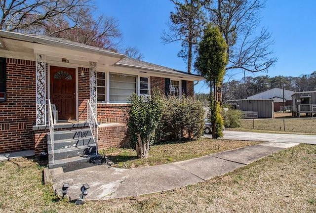 bungalow with brick siding