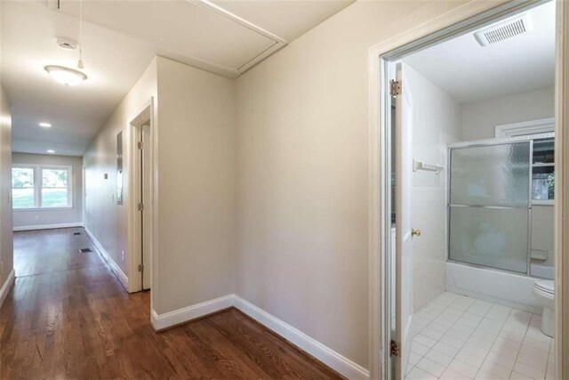 hall featuring hardwood / wood-style flooring