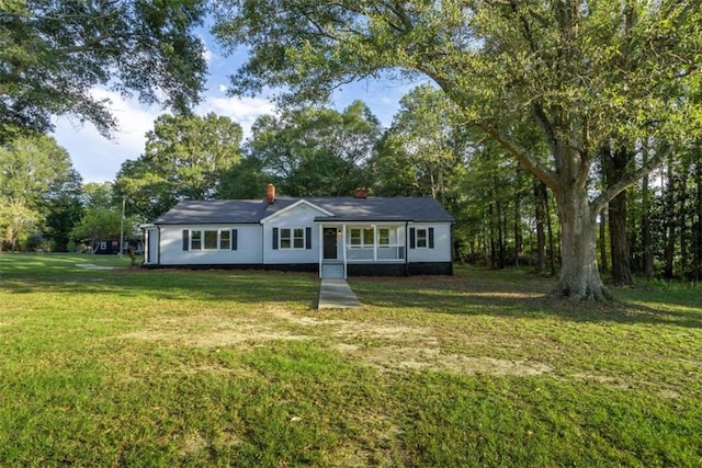 ranch-style house with a front yard