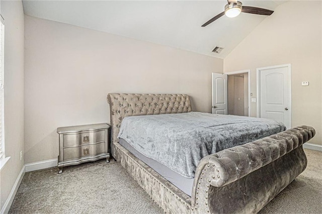 bedroom with lofted ceiling, baseboards, visible vents, and light colored carpet