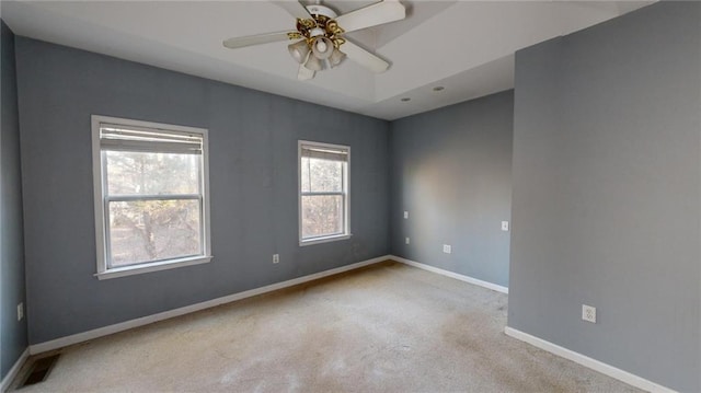 carpeted empty room with ceiling fan