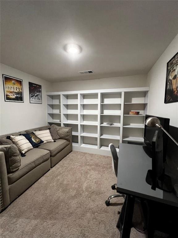 carpeted office space with visible vents