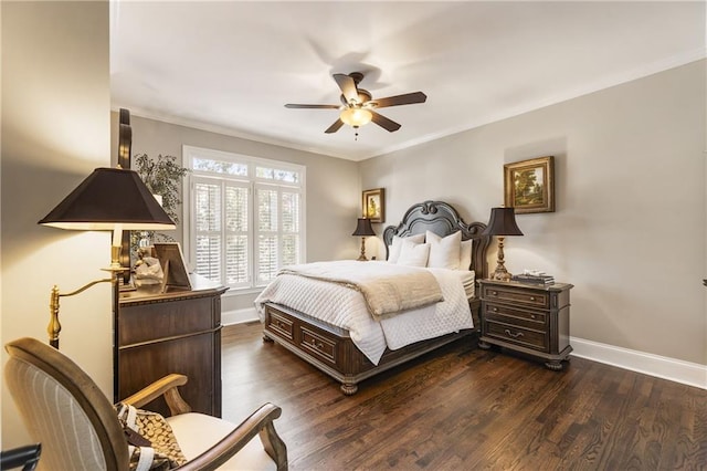 bedroom with crown molding, baseboards, ceiling fan, and dark wood-style flooring