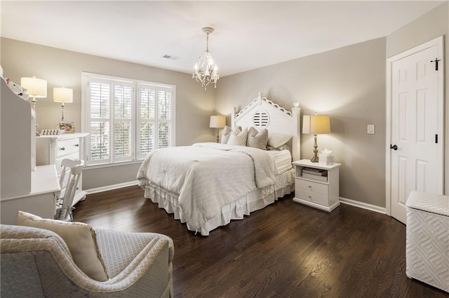 bedroom featuring dark wood-style floors, baseboards, and visible vents