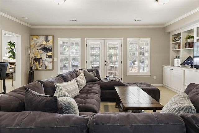 living room with light carpet, visible vents, crown molding, and french doors