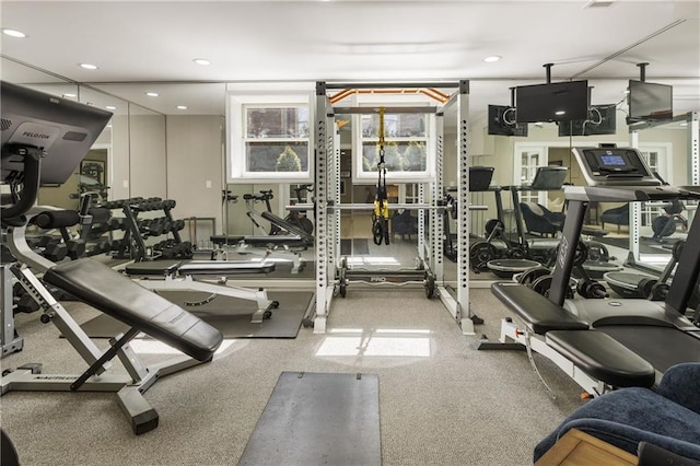 workout area featuring recessed lighting