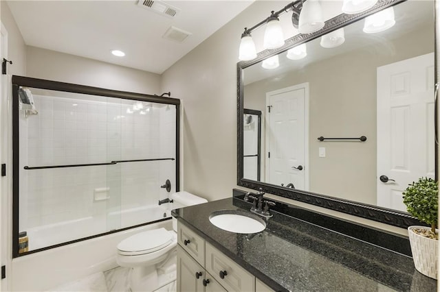 full bath featuring marble finish floor, visible vents, toilet, enclosed tub / shower combo, and vanity