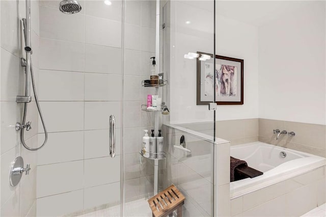 bathroom with independent shower and bath