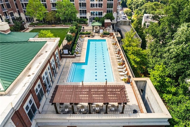 view of swimming pool with a pergola and a patio area