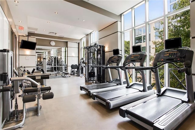 exercise room with a wall of windows