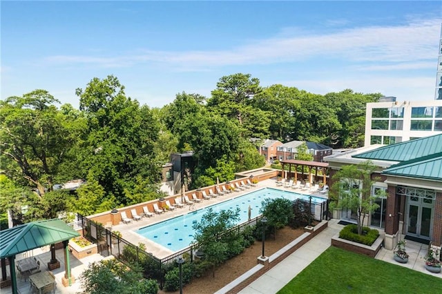 view of pool with a gazebo, a patio, and a lawn