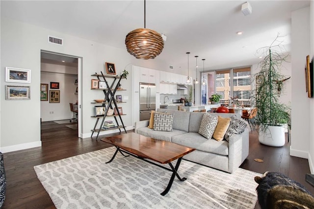 living room featuring dark hardwood / wood-style flooring