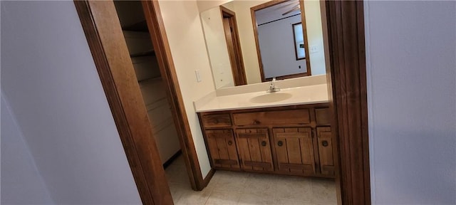 bathroom featuring vanity and tile patterned flooring
