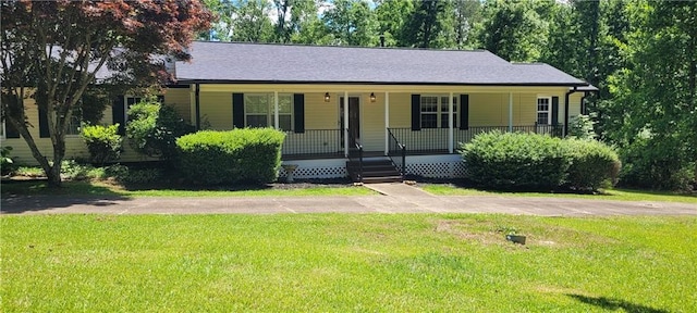 ranch-style home with a porch and a front lawn