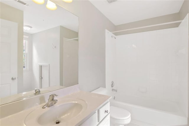 full bathroom with vanity, toilet, and bathtub / shower combination