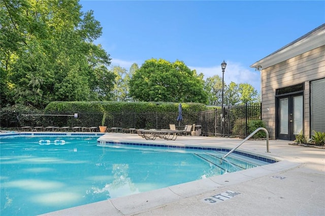 502 Brighton Pt, Atlanta, GA 30328 - community pool with french doors and a patio