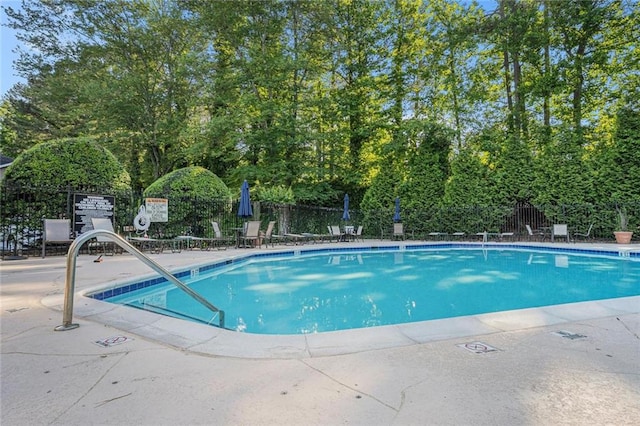 502 Brighton Pt, Atlanta, GA 30328 - community pool featuring a patio area