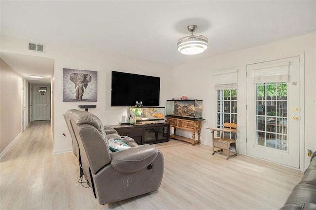 502 Brighton Pt, Atlanta, GA 30328 - living room featuring light wood-style flooring and baseboards
