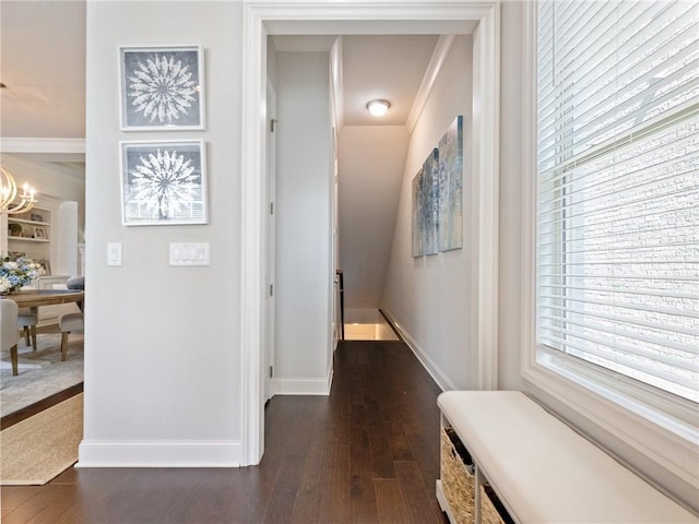 2506 Skyland Dr NE Unit 17, Atlanta, GA 30319 - corridor featuring dark wood-style flooring, baseboards, and a chandelier