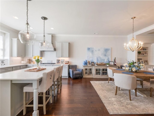 2506 Skyland Dr NE Unit 17, Atlanta, GA 30319 - dining area with dark wood-type flooring, crown molding, a chandelier, and recessed lighting