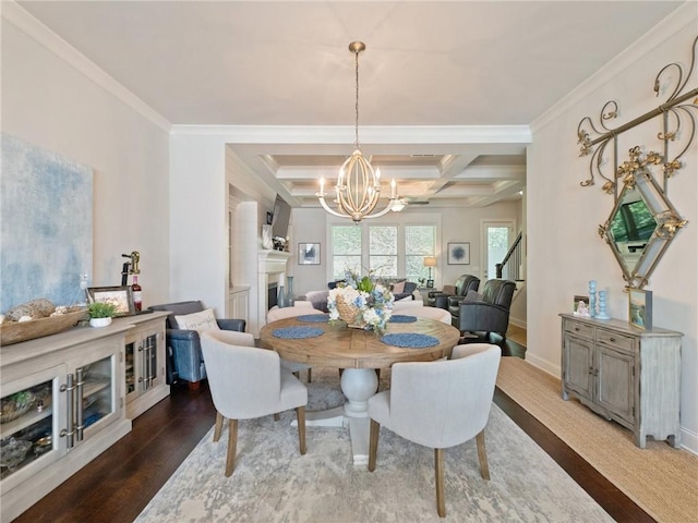2506 Skyland Dr NE Unit 17, Atlanta, GA 30319 - dining area featuring a chandelier, coffered ceiling, crown molding, wood finished floors, and beam ceiling