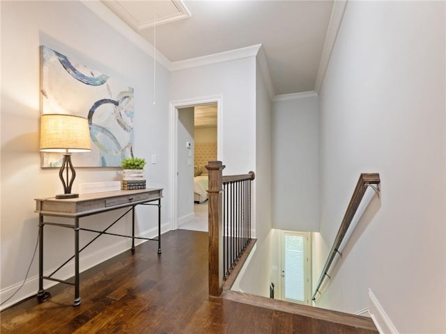 2506 Skyland Dr NE Unit 17, Atlanta, GA 30319 - corridor featuring an upstairs landing, attic access, wood finished floors, ornamental molding, and baseboards