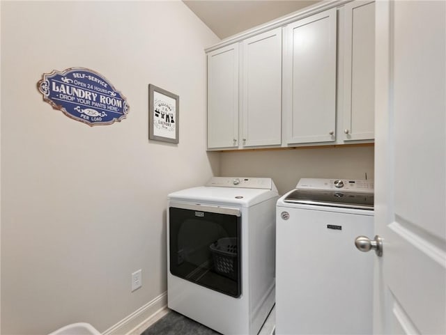 2506 Skyland Dr NE Unit 17, Atlanta, GA 30319 - laundry room featuring separate washer and dryer, cabinet space, and baseboards