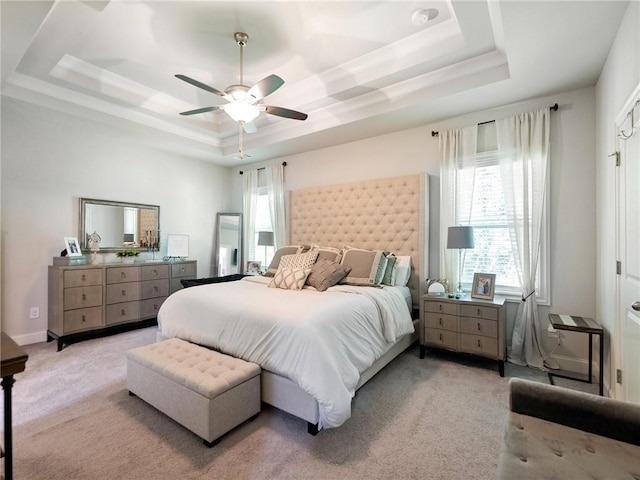 2506 Skyland Dr NE Unit 17, Atlanta, GA 30319 - bedroom featuring a tray ceiling, light colored carpet, and ceiling fan