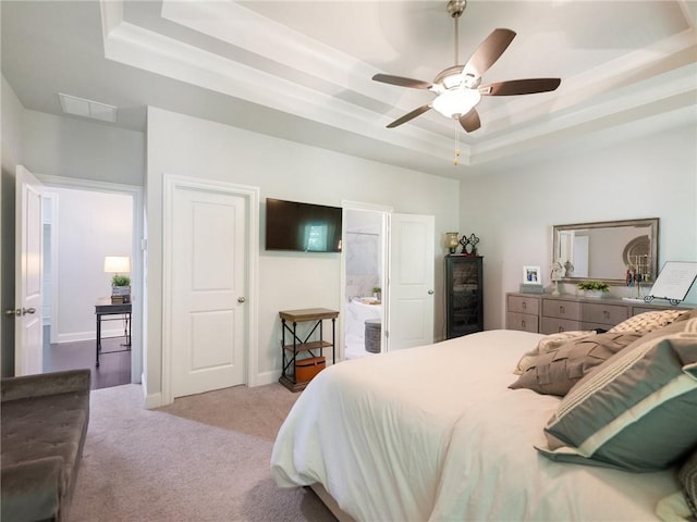 2506 Skyland Dr NE Unit 17, Atlanta, GA 30319 - bedroom featuring a raised ceiling, light colored carpet, baseboards, ensuite bathroom, and ceiling fan