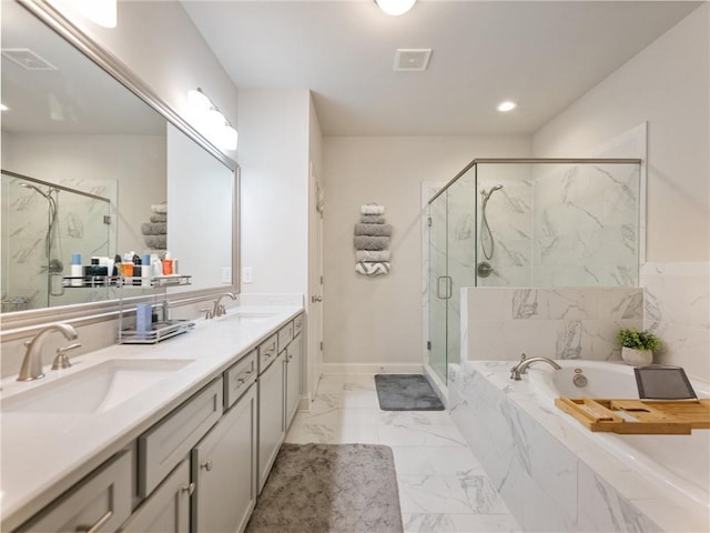 2506 Skyland Dr NE Unit 17, Atlanta, GA 30319 - bathroom featuring a bath, marble finish floors, a marble finish shower, double vanity, and recessed lighting