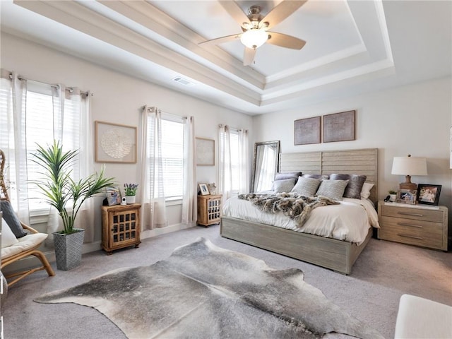 2506 Skyland Dr NE Unit 17, Atlanta, GA 30319 - bedroom with carpet floors, a tray ceiling, multiple windows, and a ceiling fan