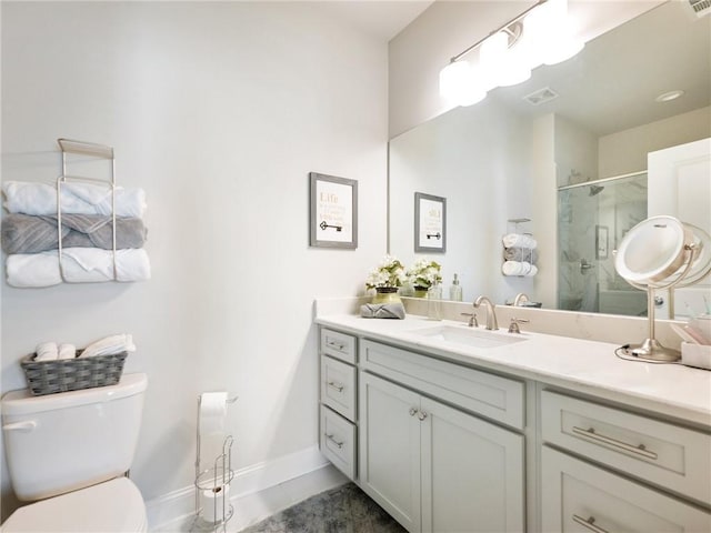 2506 Skyland Dr NE Unit 17, Atlanta, GA 30319 - bathroom featuring a shower stall, vanity, toilet, tile patterned floors, and baseboards