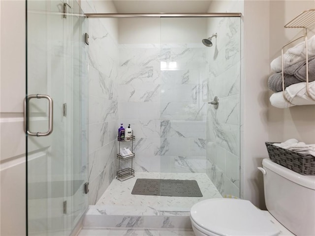 2506 Skyland Dr NE Unit 17, Atlanta, GA 30319 - bathroom with toilet and a marble finish shower