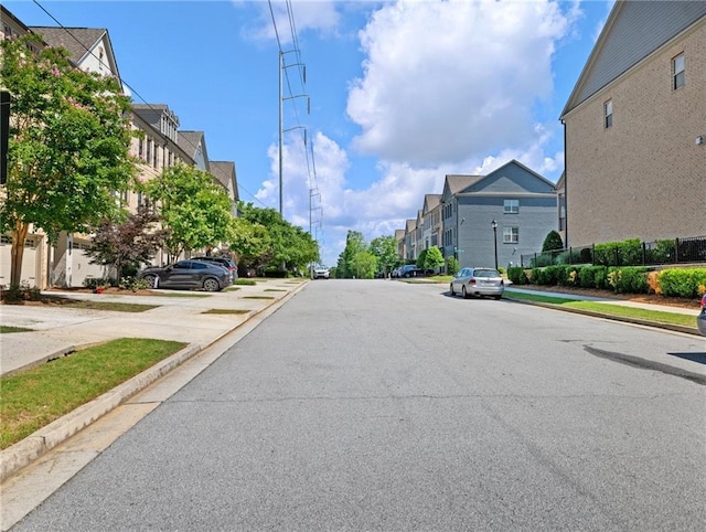 2506 Skyland Dr NE Unit 17, Atlanta, GA 30319 - view of asphalt street featuring sidewalks, curbs, and a residential view