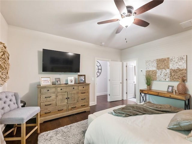 2506 Skyland Dr NE Unit 17, Atlanta, GA 30319 - bedroom featuring dark wood finished floors, a ceiling fan, and baseboards