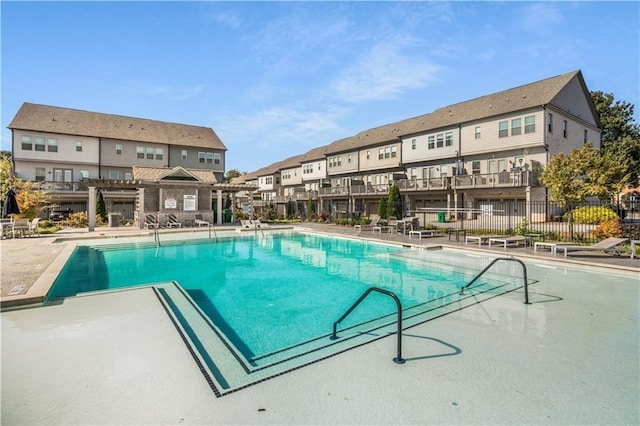 2506 Skyland Dr NE Unit 17, Atlanta, GA 30319 - community pool with a pergola, a residential view, and a patio area