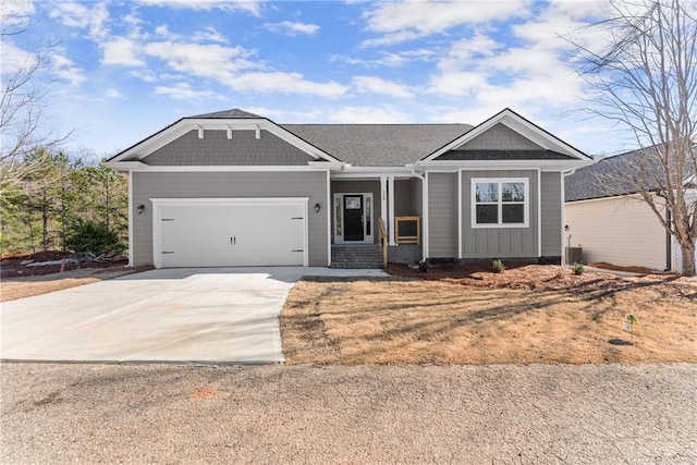 view of front of home featuring a garage and concrete driveway