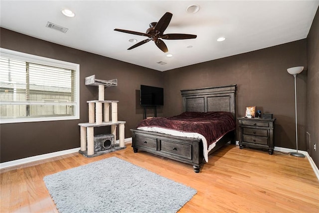 3501 Roswell Rd NE Unit 211, Atlanta, GA 30305 - bedroom with baseboards, light wood-style flooring, recessed lighting, and a ceiling fan