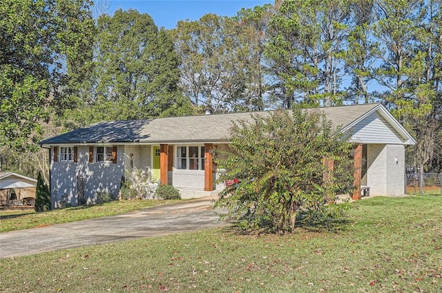 view of front of home with a front lawn