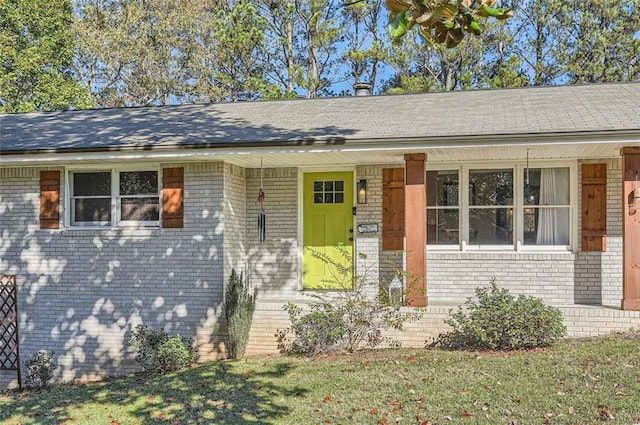 view of front of home with a front yard